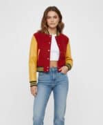 Colorful women's varsity jacket with red, yellow, and green accents, perfect for casual streetwear.