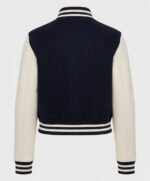 Classic varsity jacket with contrasting white sleeves and navy body, featuring striped ribbed cuffs and collar for a sporty vibe.